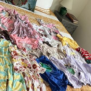 Lot of Girls' Dresses, Jumpsuits, Tops, PJs,- priced a $1 per item